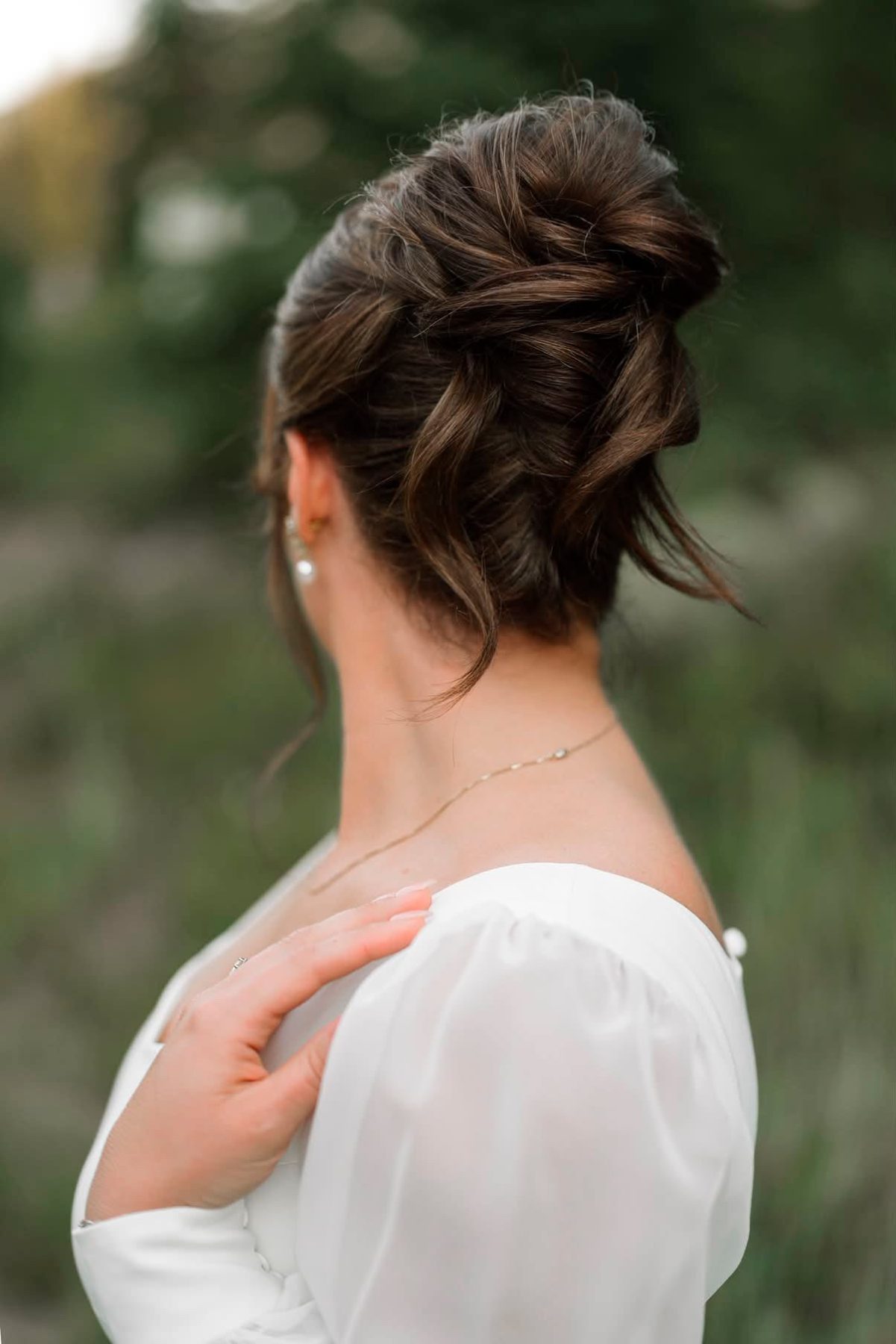 Textured bridal updo, photographed from behind